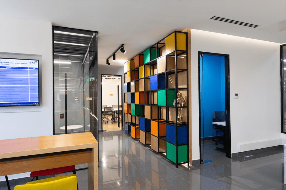 Office space showing colourful storage units. Designed by Arcs Africa for BAT offices in Industrial area